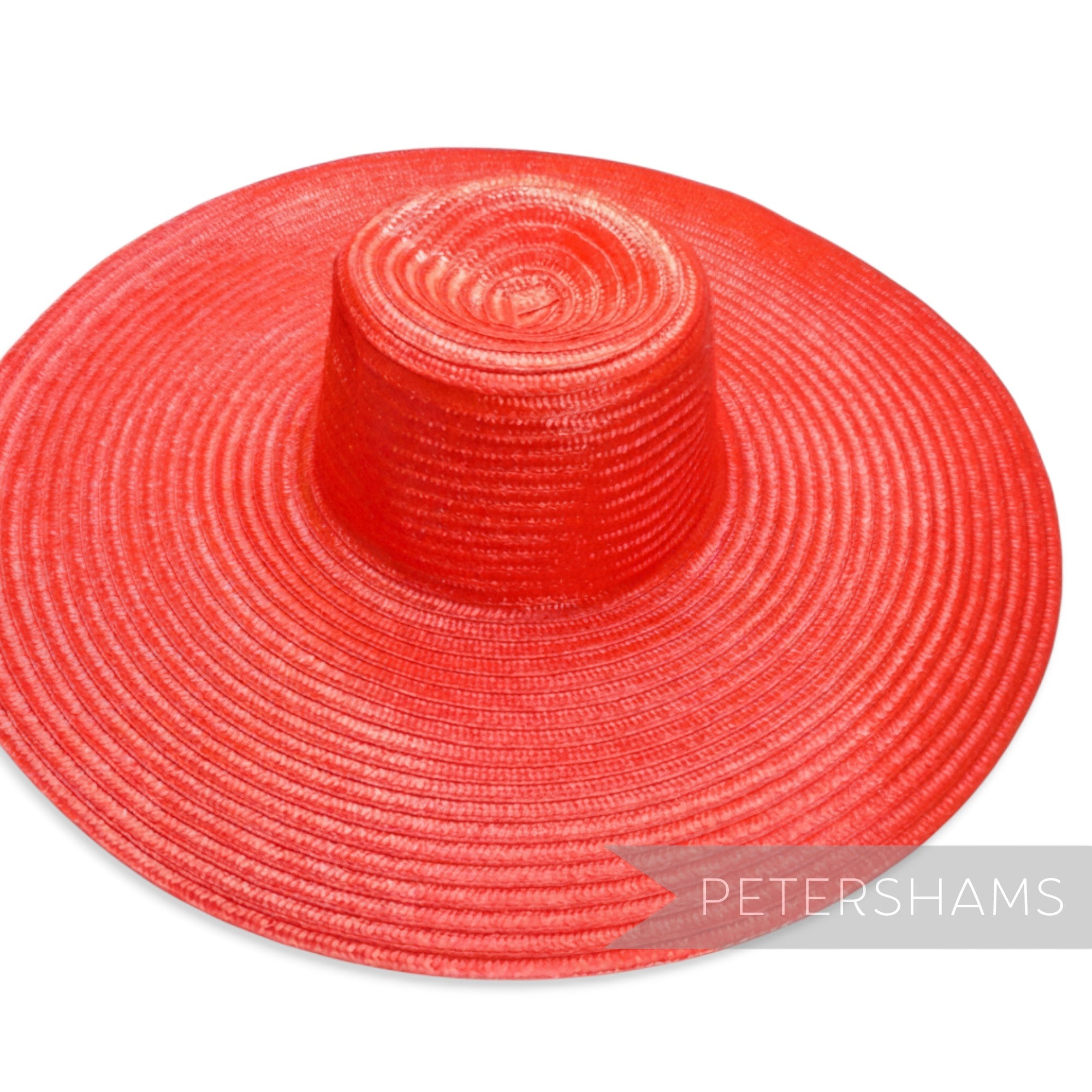 Petershams Millinery Supplies red XL polybraid capeline hat body with a wide brim and slight shine.