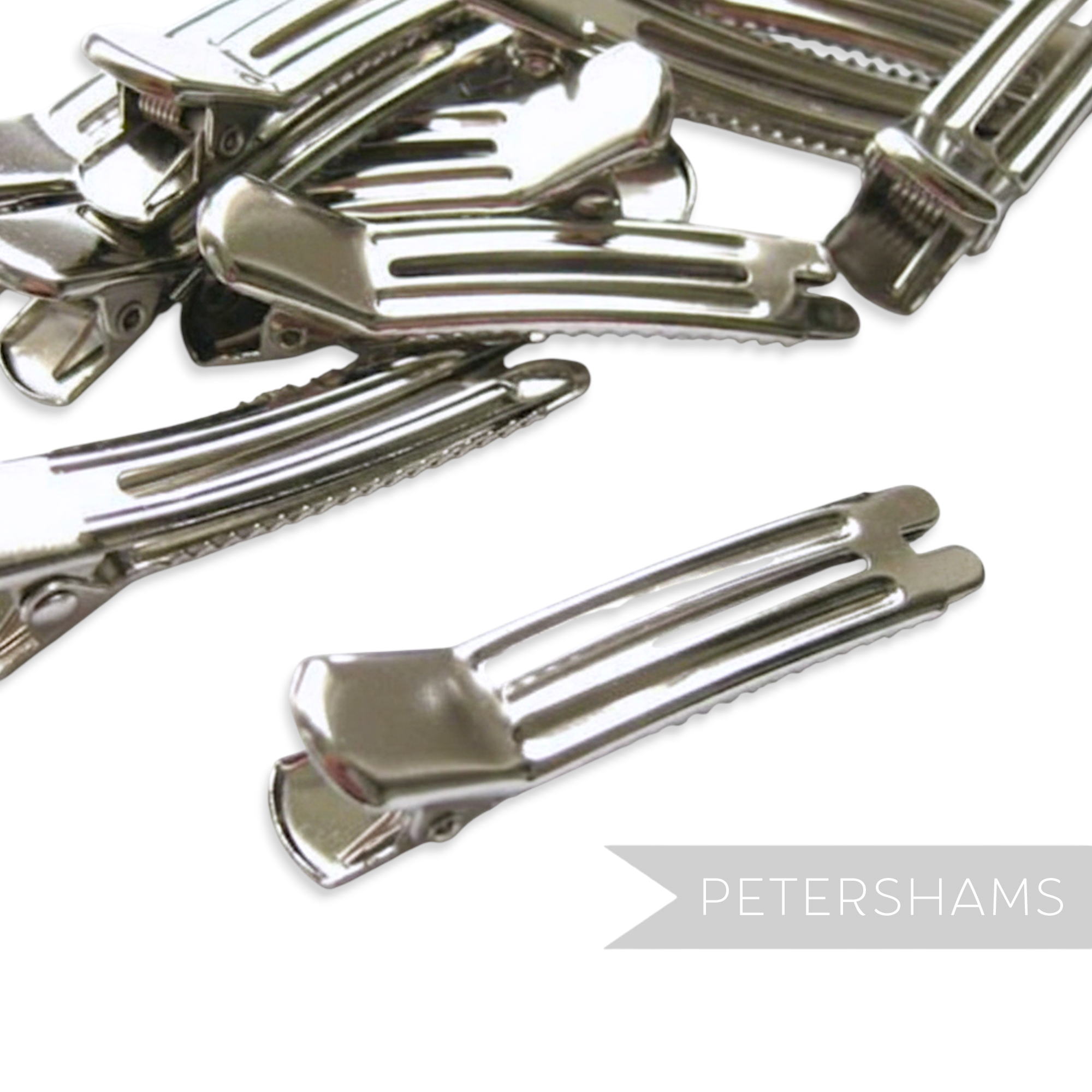 Petershams Millinery Supplies ten silver metal alligator hair clips, 2" long, for fascinators and hair accessories.