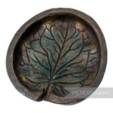 Petershams Millinery Supplies antique brass flower mould for creating a large rounded nasturtium leaf shape.