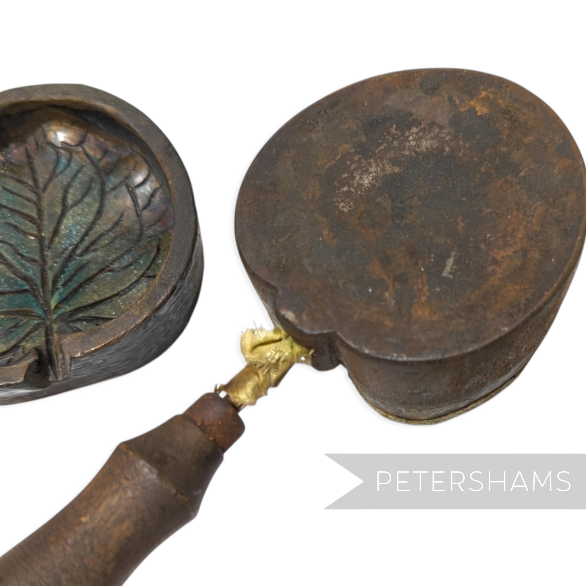 Petershams Millinery Supplies antique brass flower mould and cutter for crafting a large rounded nasturtium leaf.