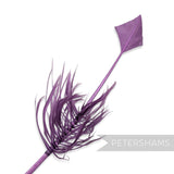 Petershams Millinery Supplies amethyst turkey quill feather cut into an arrowhead shape with decorative barbed accents.
