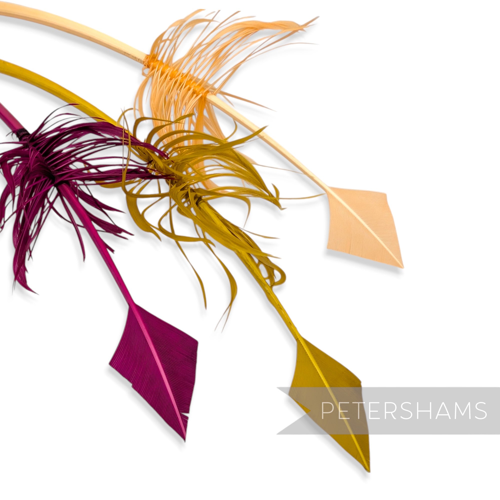 Petershams Millinery Supplies arrowhead turkey quill feathers in burgundy, gold, and peach for hat making