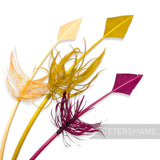 Petershams Millinery Supplies barbed arrowhead turkey quill feathers in cream, yellow, and magenta for headpieces.