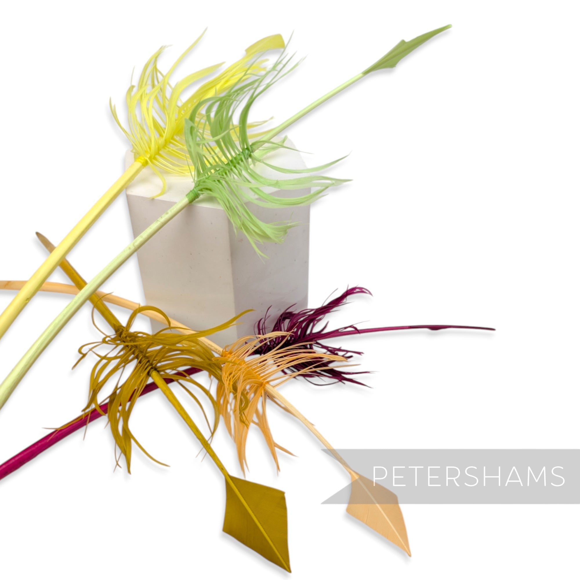 Petershams Millinery Supplies barbed turkey quill feathers in assorted colours cut into arrowhead shapes for millinery