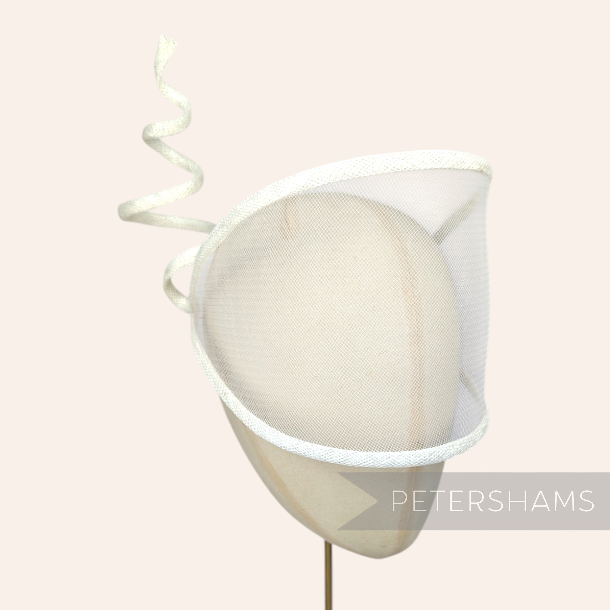 Petershams Millinery Supplies Astra light beige crin and sinamay visor fascinator with a wired spiral trim.