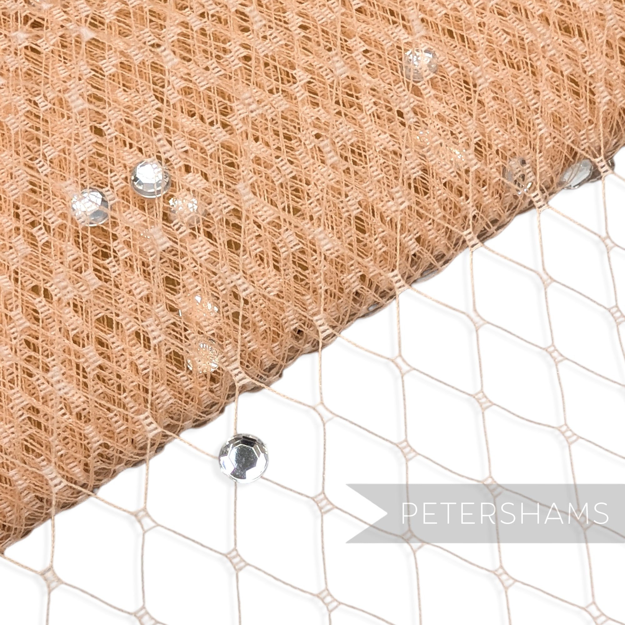 Petershams Millinery Supplies beige diamond-patterned veiling embellished with clear acrylic diamantes for millinery.