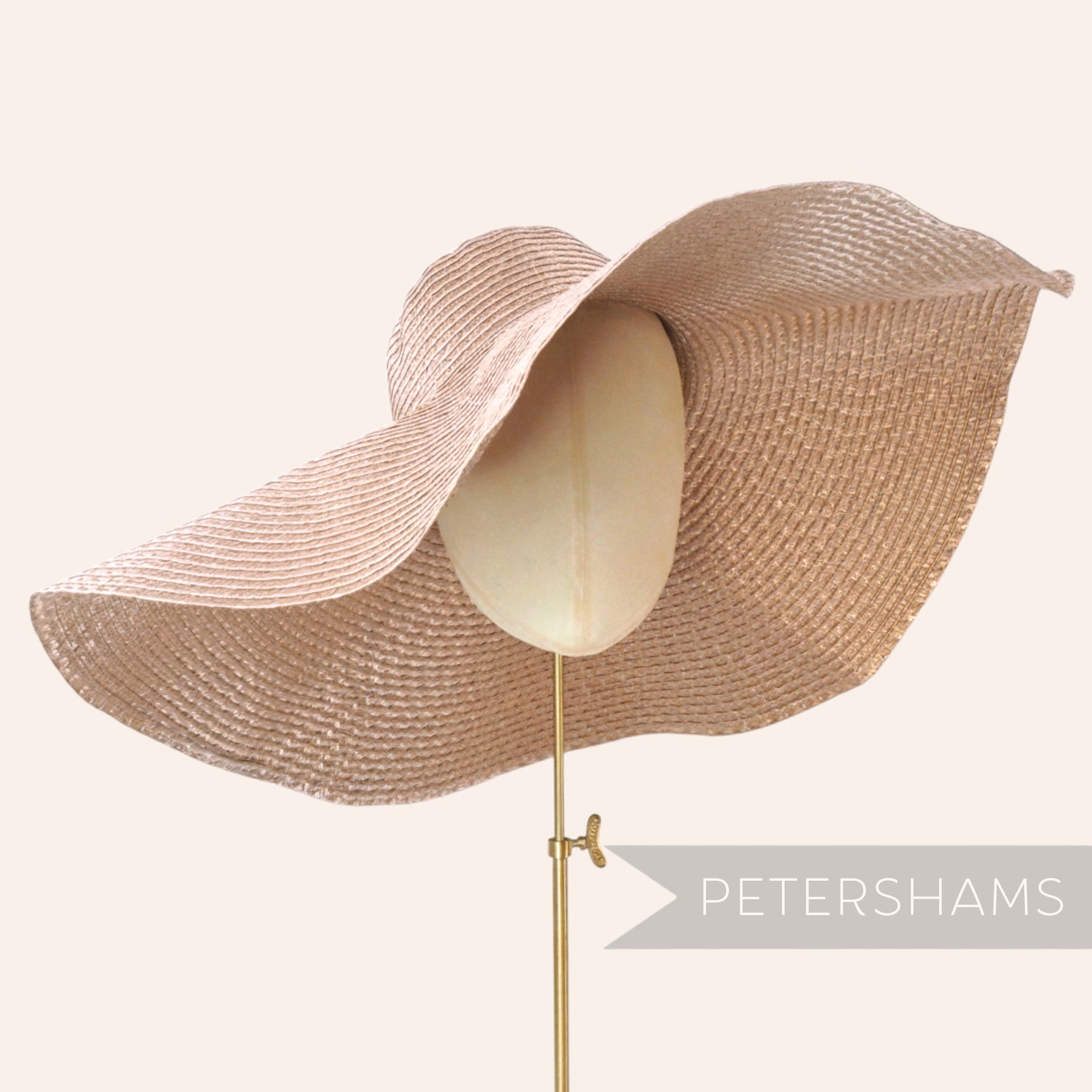 Petershams Millinery Supplies large beige polybraid capeline hat base with intricate weave and wide brim.