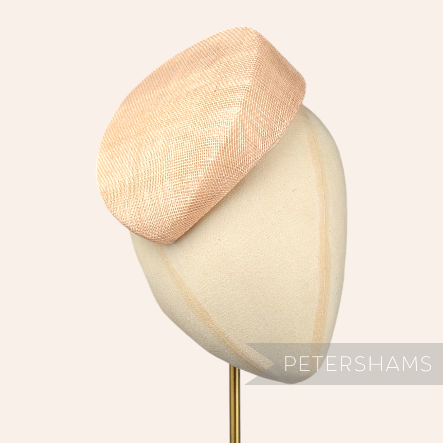 Petershams Millinery Supplies Betty sloped pillbox sinamay fascinator hat base in a light beige tone.
