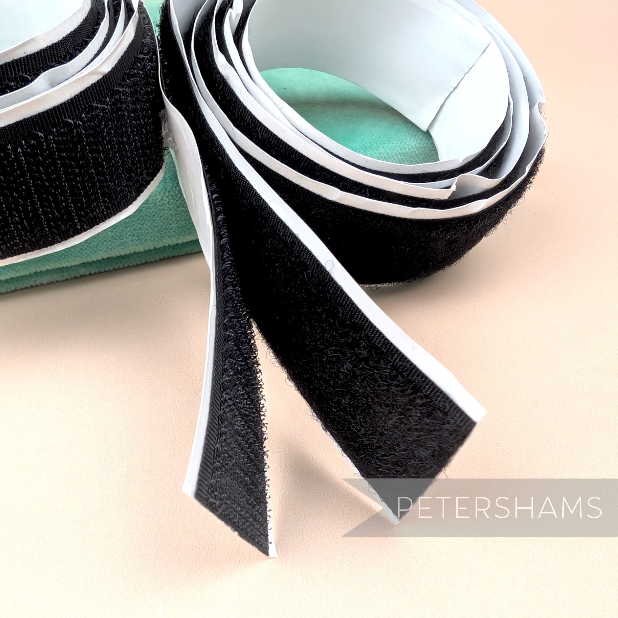 Petershams Millinery Supplies 25mm black self-adhesive hook and loop fastening tape on a roll
