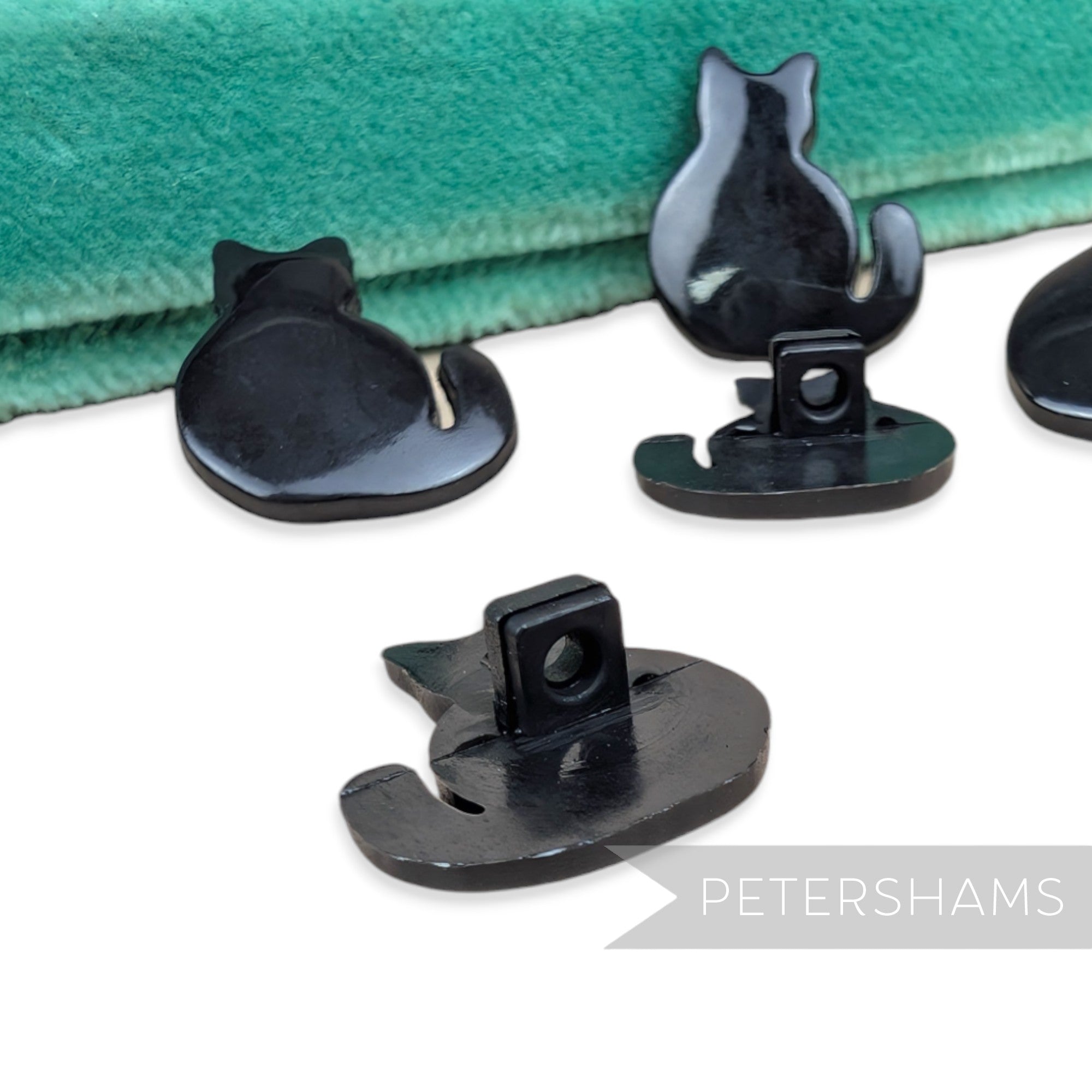 Petershams Millinery Supplies 18mm glossy black plastic cat-shaped shank buttons for sewing and crafts.