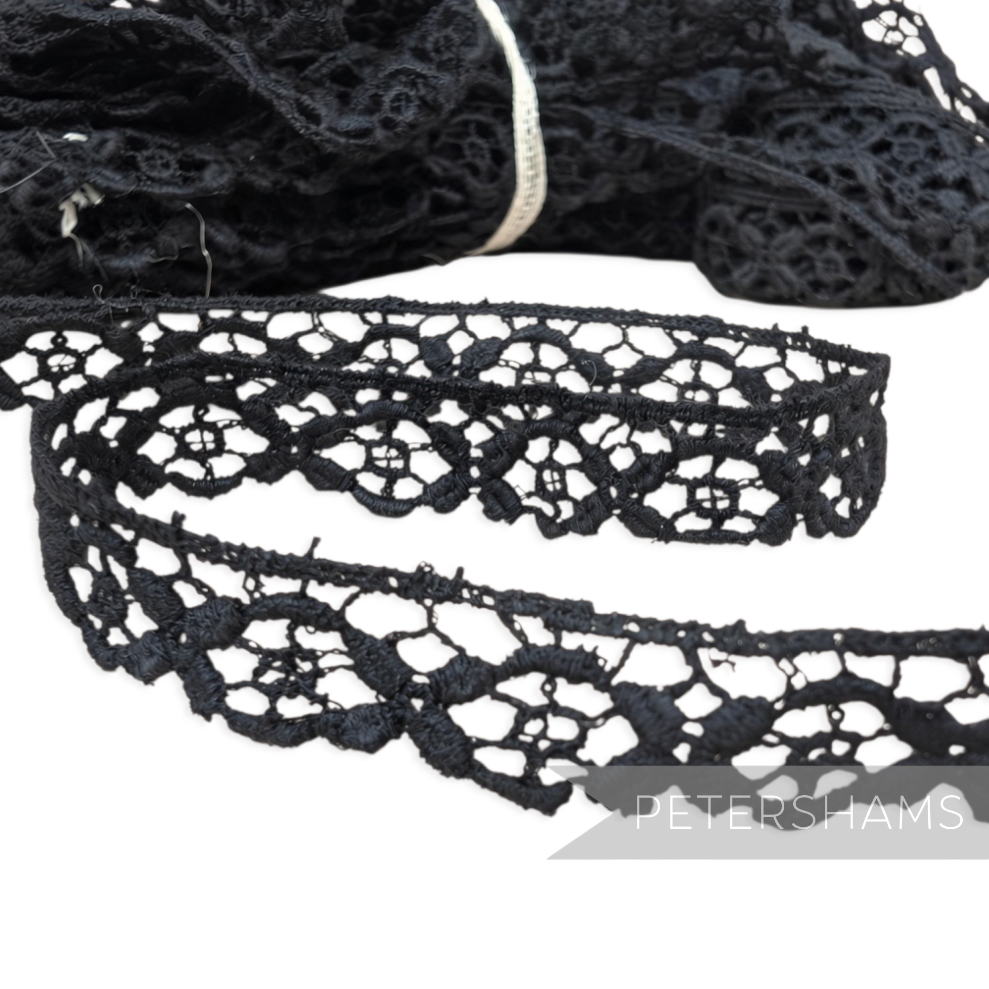 Petershams Millinery Supplies vintage 11mm black cotton guipure lace trim with a classic floral pattern.