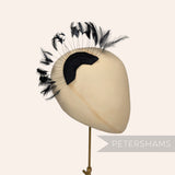 Petershams Millinery Supplies black stripped hackle feather fan on a cotton base for hat and fascinator trimming.
