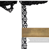 Petershams Millinery Supplies 11mm black vintage cotton guipure lace trim with a delicate floral pattern.