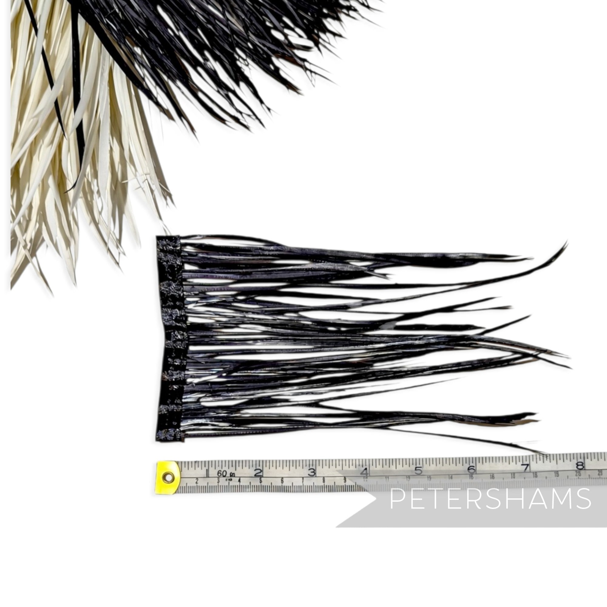 Petershams Millinery Supplies extra long black goose biot feather fringe on a satin binding