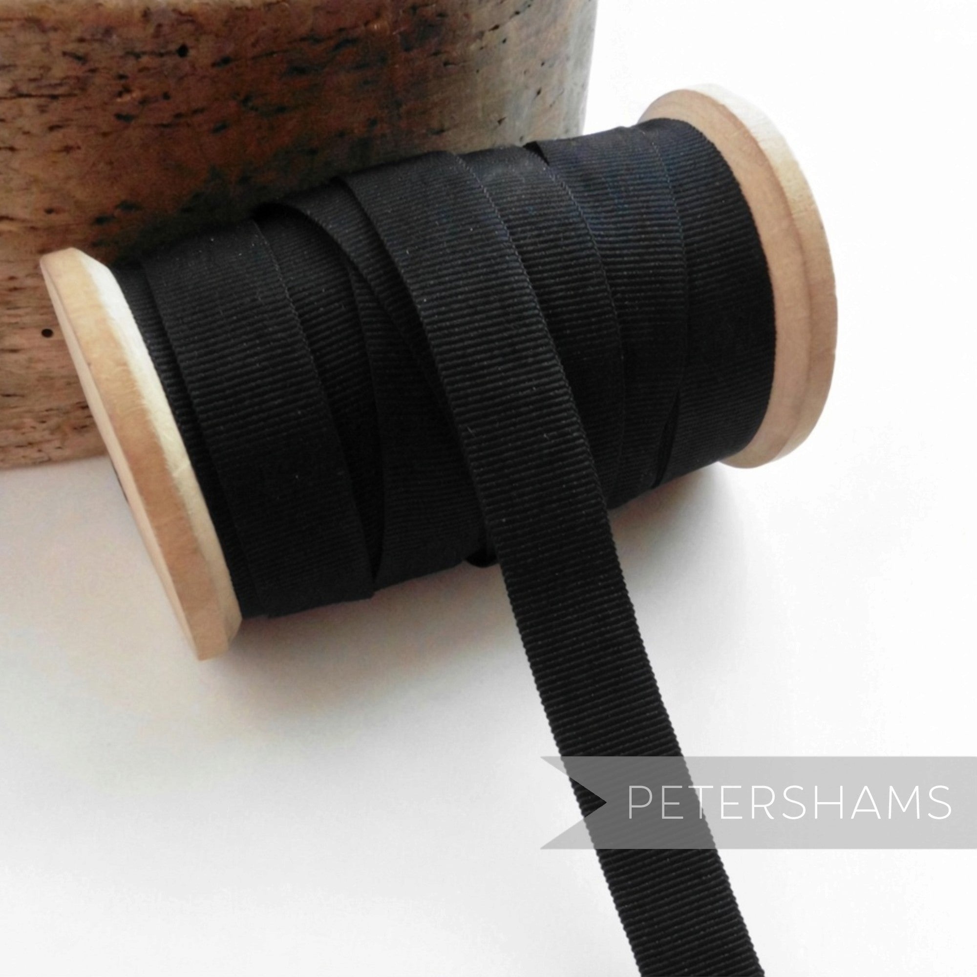 Petershams Millinery Supplies 15mm wide black vintage grosgrain ribbon on a wooden spool for hat trimming