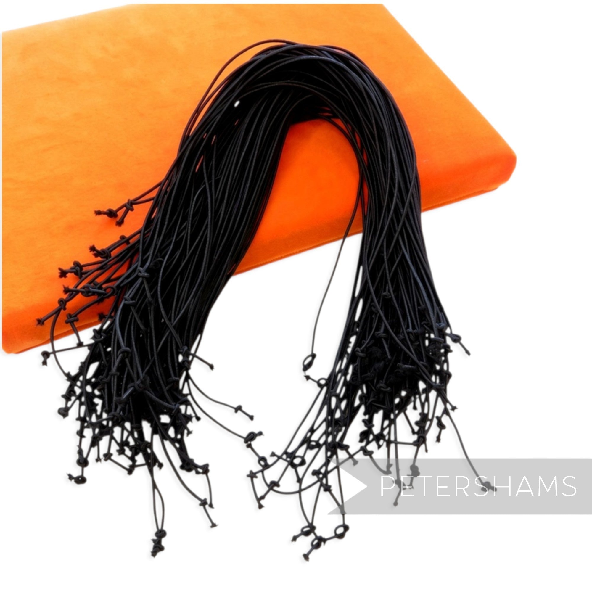 Petershams Millinery Supplies black 1.5mm pre-knotted hat elastics for securing fascinators and headpieces.