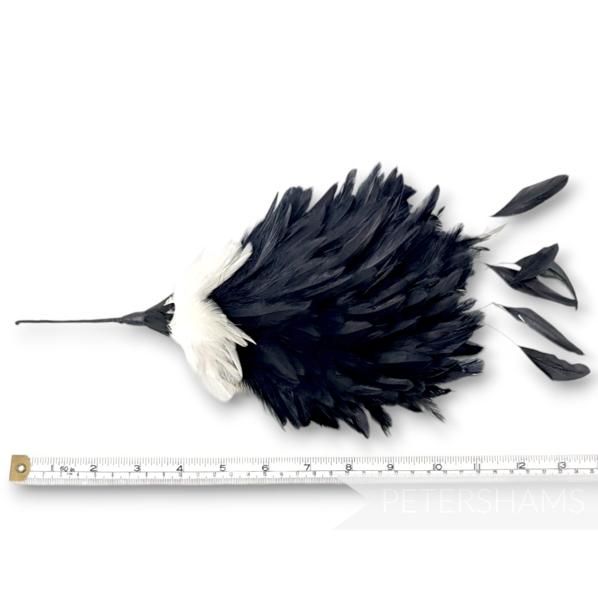 Petershams Millinery Supplies large black and ivory coque feather hat mount with wire stem and lady amherst feathers.