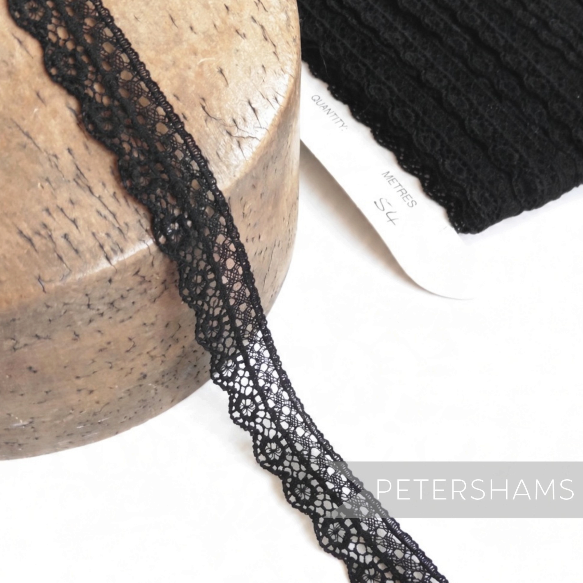 Petershams Millinery Supplies 15mm black cotton blend lace trim with a delicate lattice pattern and scalloped edge