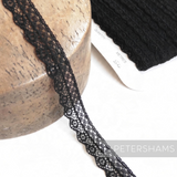 Petershams Millinery Supplies 15mm black cotton blend lace trim with a delicate lattice pattern and scalloped edge