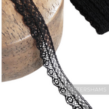 Petershams Millinery Supplies 15mm delicate black cotton lace trim with a fine lattice design and scalloped edge.
