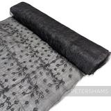 Petershams Millinery Supplies black sinamay fabric with leaf embroidery and organza backing on a roll