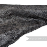 Petershams Millinery Supplies black sinamay fabric with leaf embroidery and shimmery organza backing