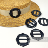 Petershams Millinery Supplies vintage black plastic octagon hat buckles with flat backs for millinery projects.