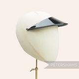 Petershams Millinery Supplies black patent leather cap peak with glossy finish