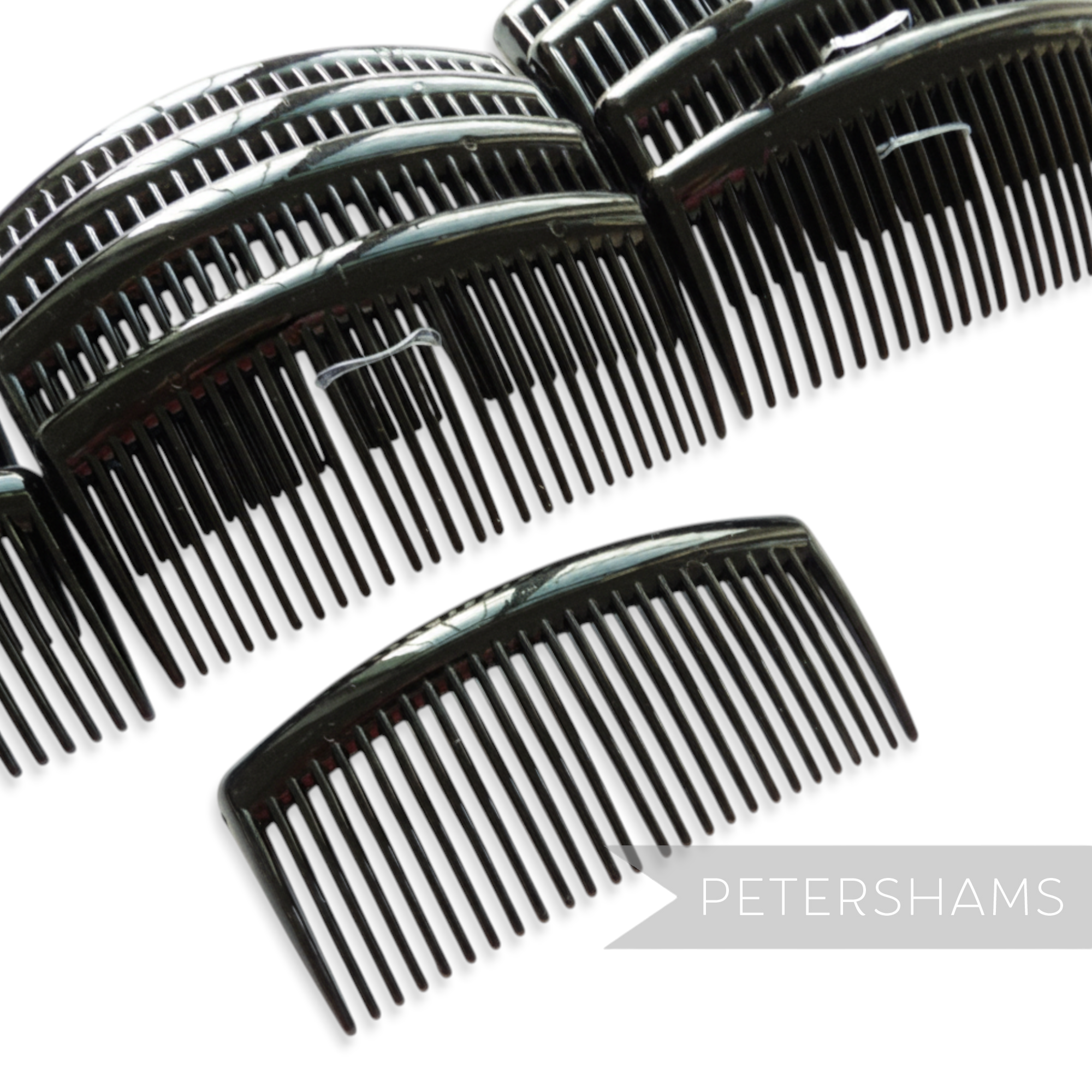 Petershams Millinery Supplies black plastic hair combs, 9.5cm wide, sturdy for hat making.