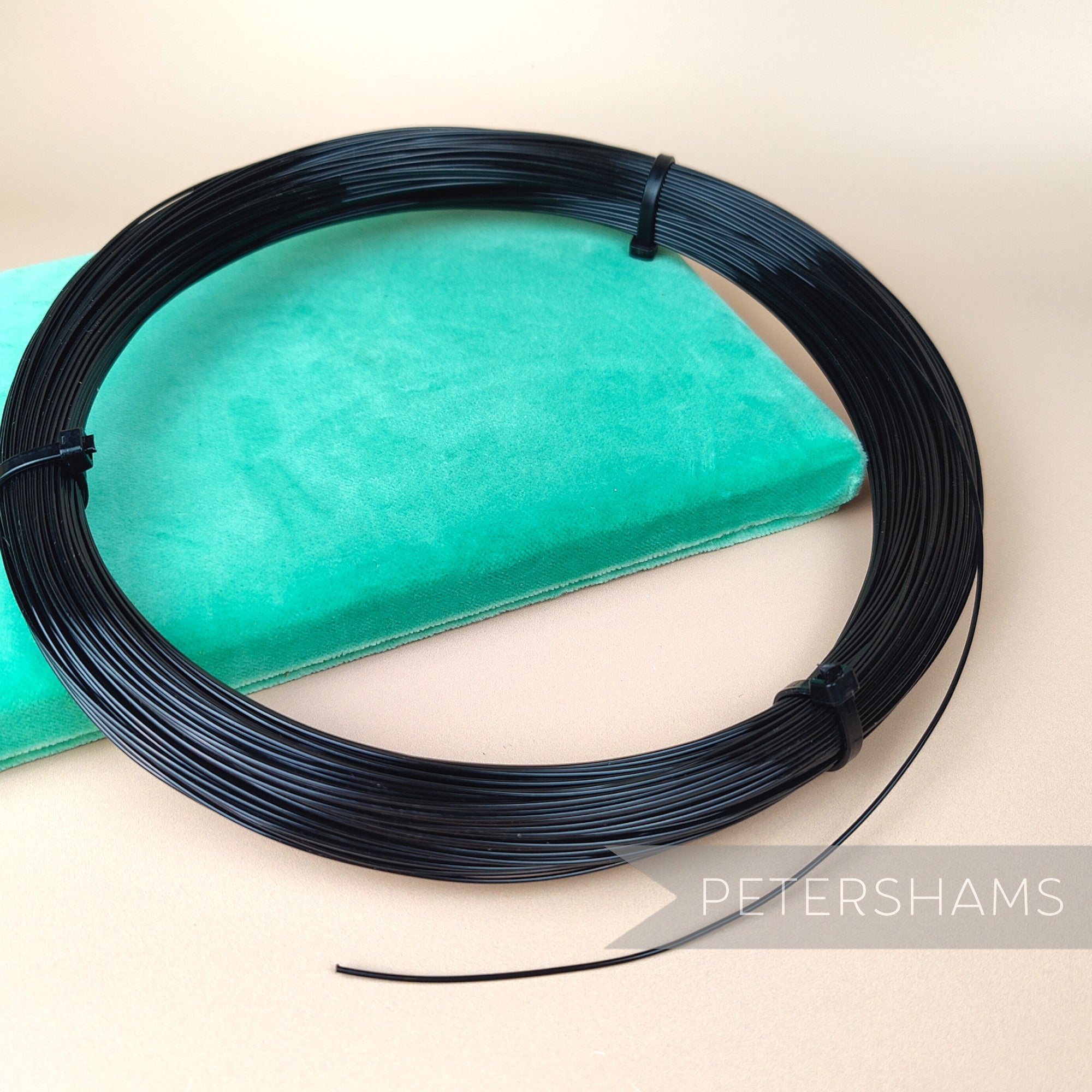 Petershams Millinery Supplies 1.2mm black plastic hat brim wire coiled for millinery structure and shaping.
