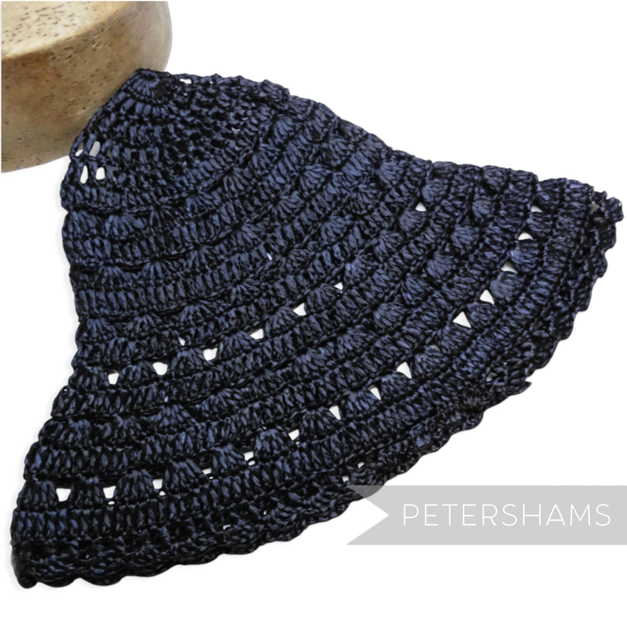 Petershams Millinery Supplies vintage 1970s black laminated raffia crochet flare hat body for millinery projects.