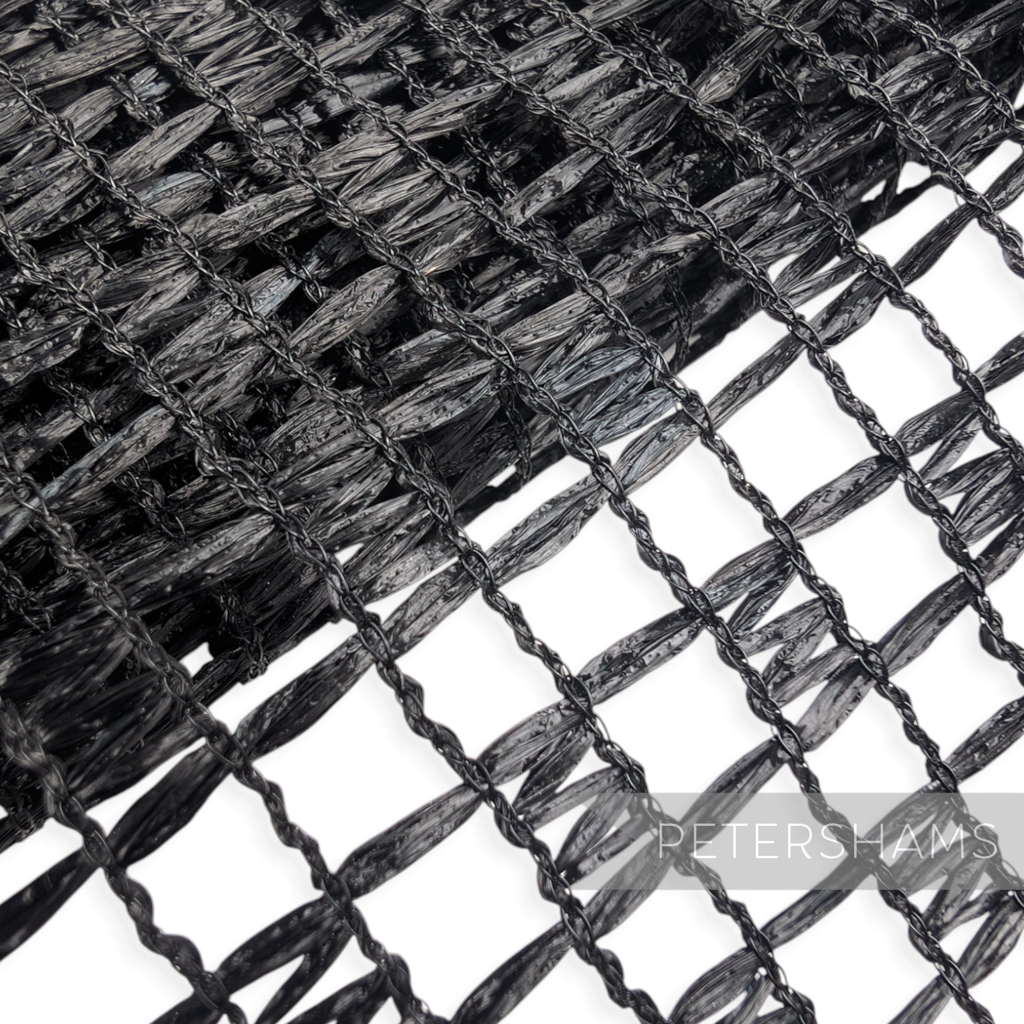 Petershams Millinery Supplies vintage black laminated raffia mesh fabric with a glossy checkerboard weave pattern.