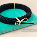 Petershams Millinery Supplies black rayon covered 1.2mm millinery wire coiled