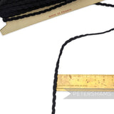 Petershams Millinery Supplies vintage black silky Russia braid trim on a card, measuring 4mm wide.