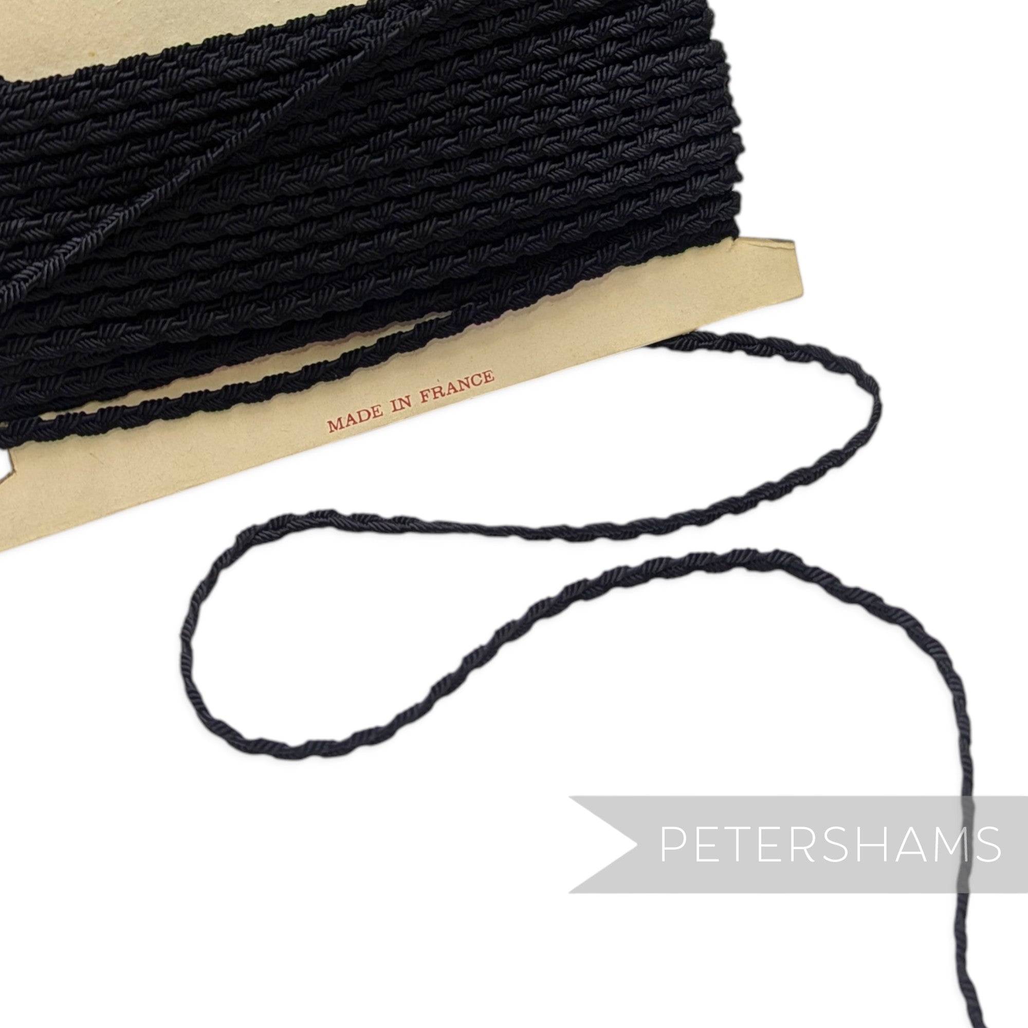 Petershams Millinery Supplies vintage black silky braided trim on a card for hat making and jewelry design