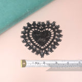 Petershams Millinery Supplies black lace heart motif with sequins and beads, 8cm wide for hat decoration.