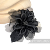 Petershams Millinery Supplies black dahlia hat mount featuring layered silk and sheer organza petals with wired leaves.