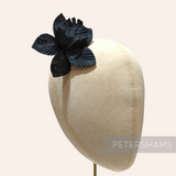 Petershams Millinery Supplies Coco black silk orchid flower hat mount on a millinery display head
