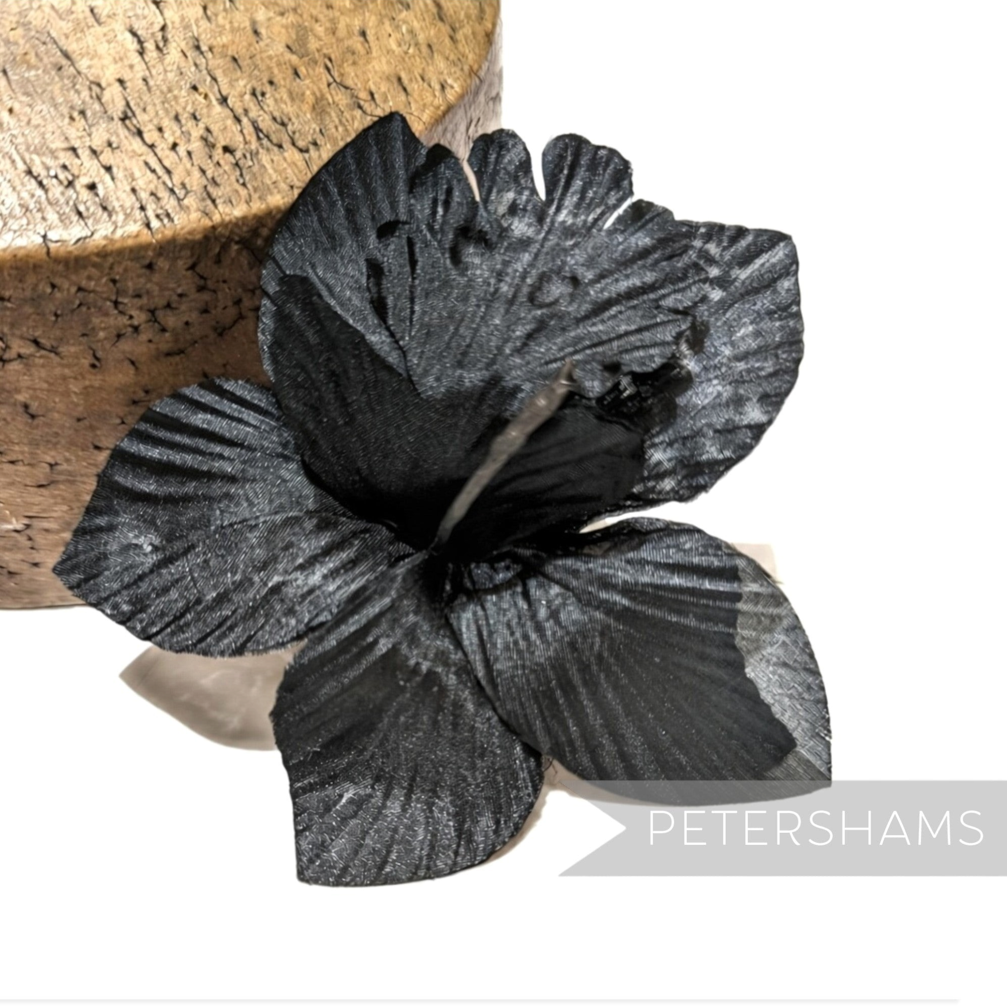 Petershams Millinery Supplies black silk orchid flower hat mount for fascinators and millinery projects.