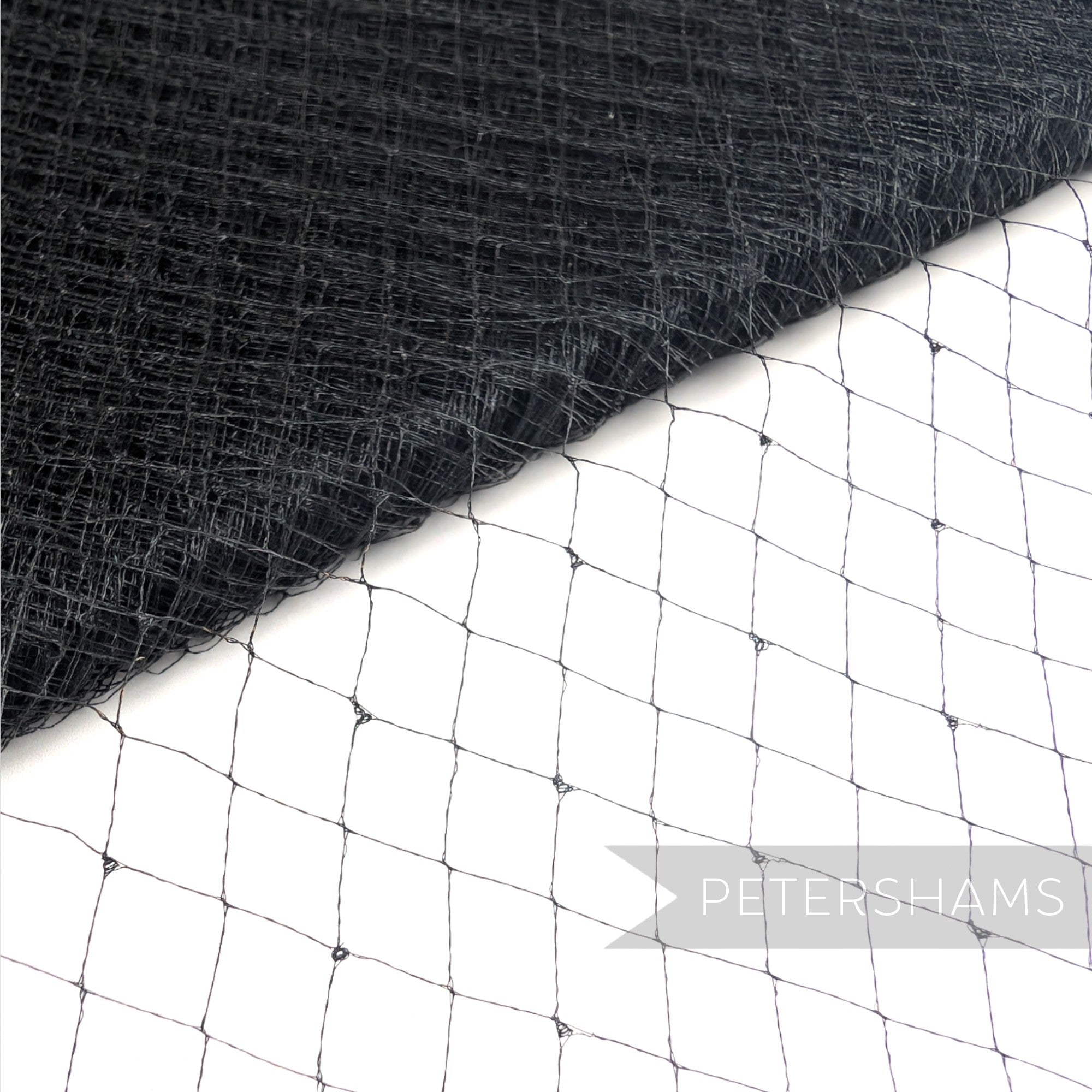 Petershams Millinery Supplies vintage black silk veiling with a delicate dotty-effect diamond weave pattern.