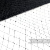 Petershams Millinery Supplies vintage black silk veiling with a delicate diamond dotty-effect pattern.