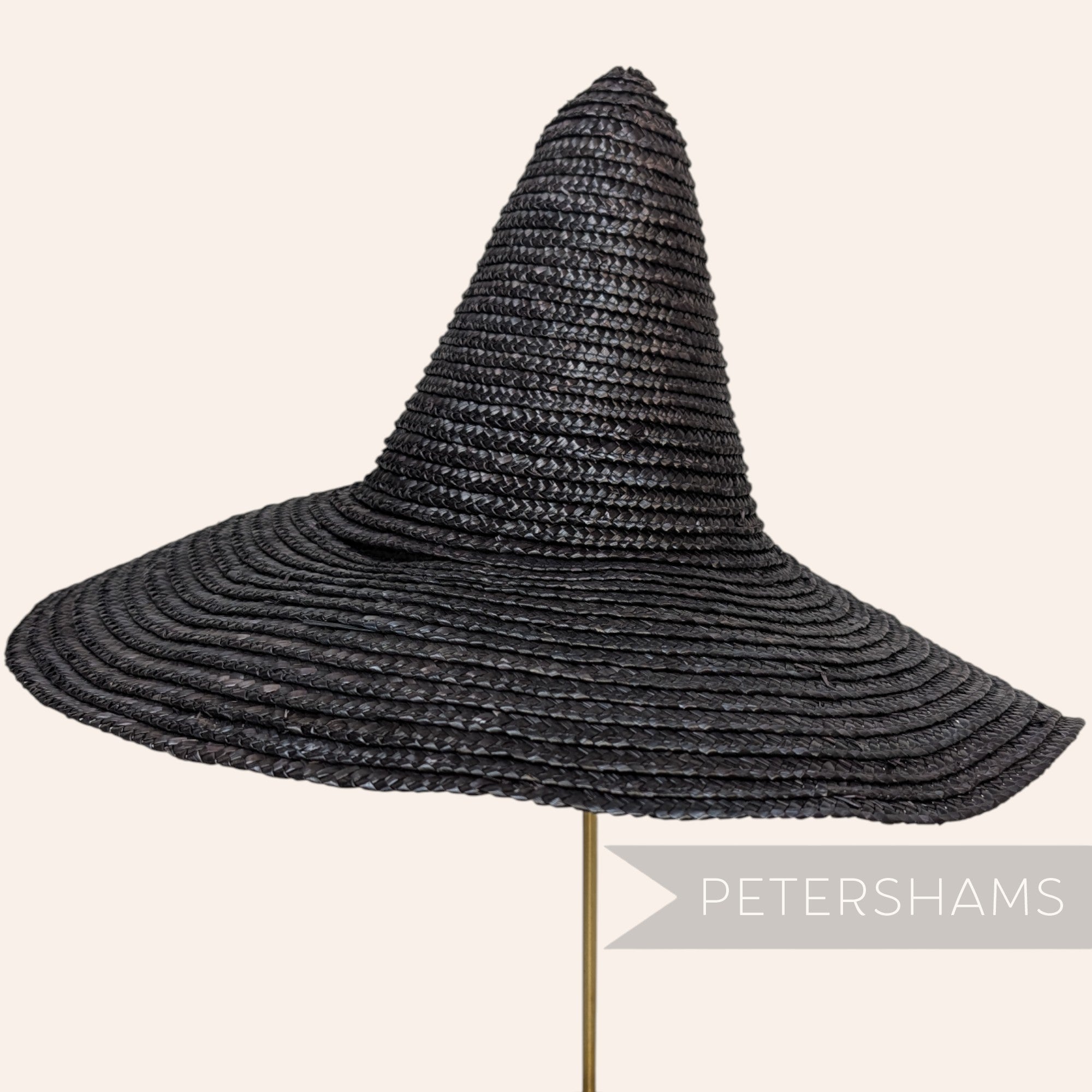 Petershams Millinery Supplies vintage black Swiss straw witches hat capeline form with a high crown and wide brim.
