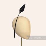 Petershams Millinery Supplies black arrowhead turkey quill feather displayed