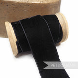 Petershams Millinery Supplies 36mm black French velvet ribbon on a wooden spool with a luxurious pile and sheen.