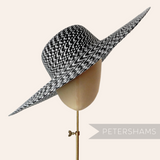 Petershams Millinery Supplies black and white polybraid capeline hat body with an undulating brim