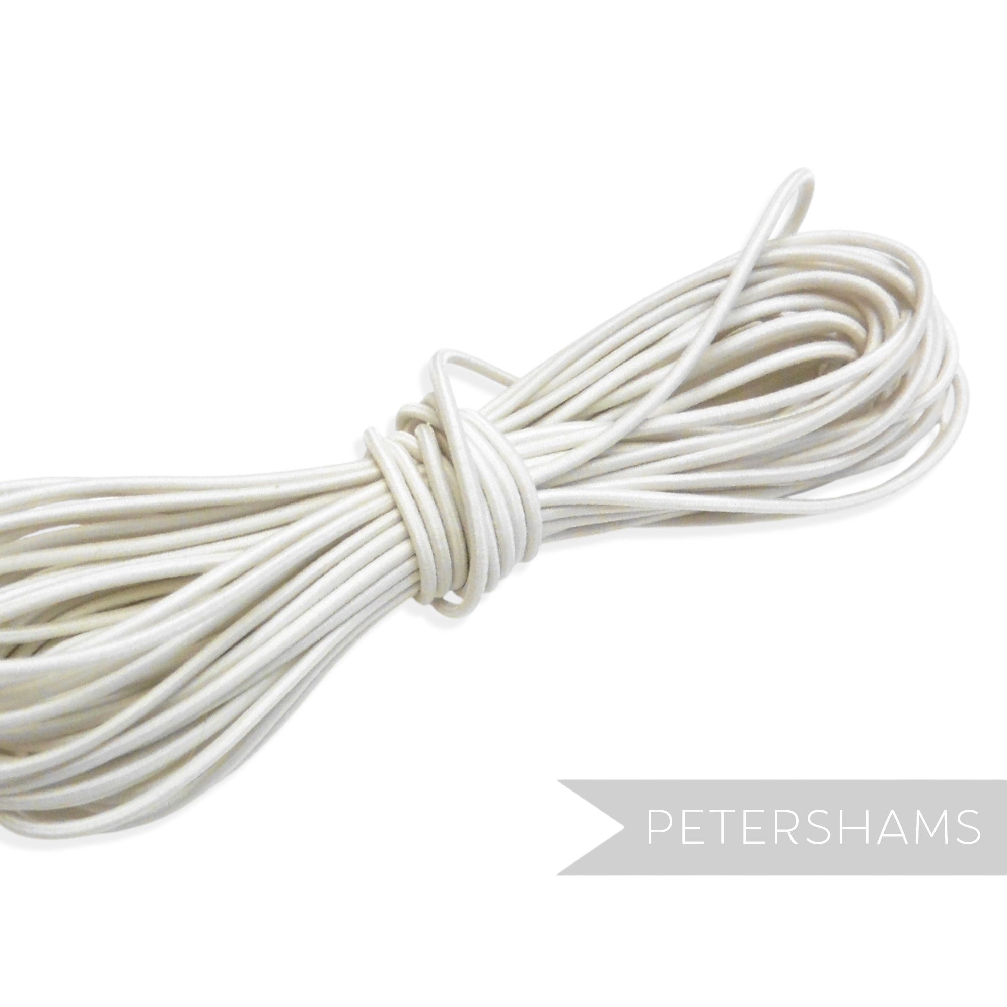 Petershams Millinery Supplies 1.5mm blonde round hat elastic cord for securing fascinators and headpieces.