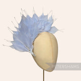 Petershams Millinery Supplies large light blue spiky goose feather wired hat mount on a mannequin head