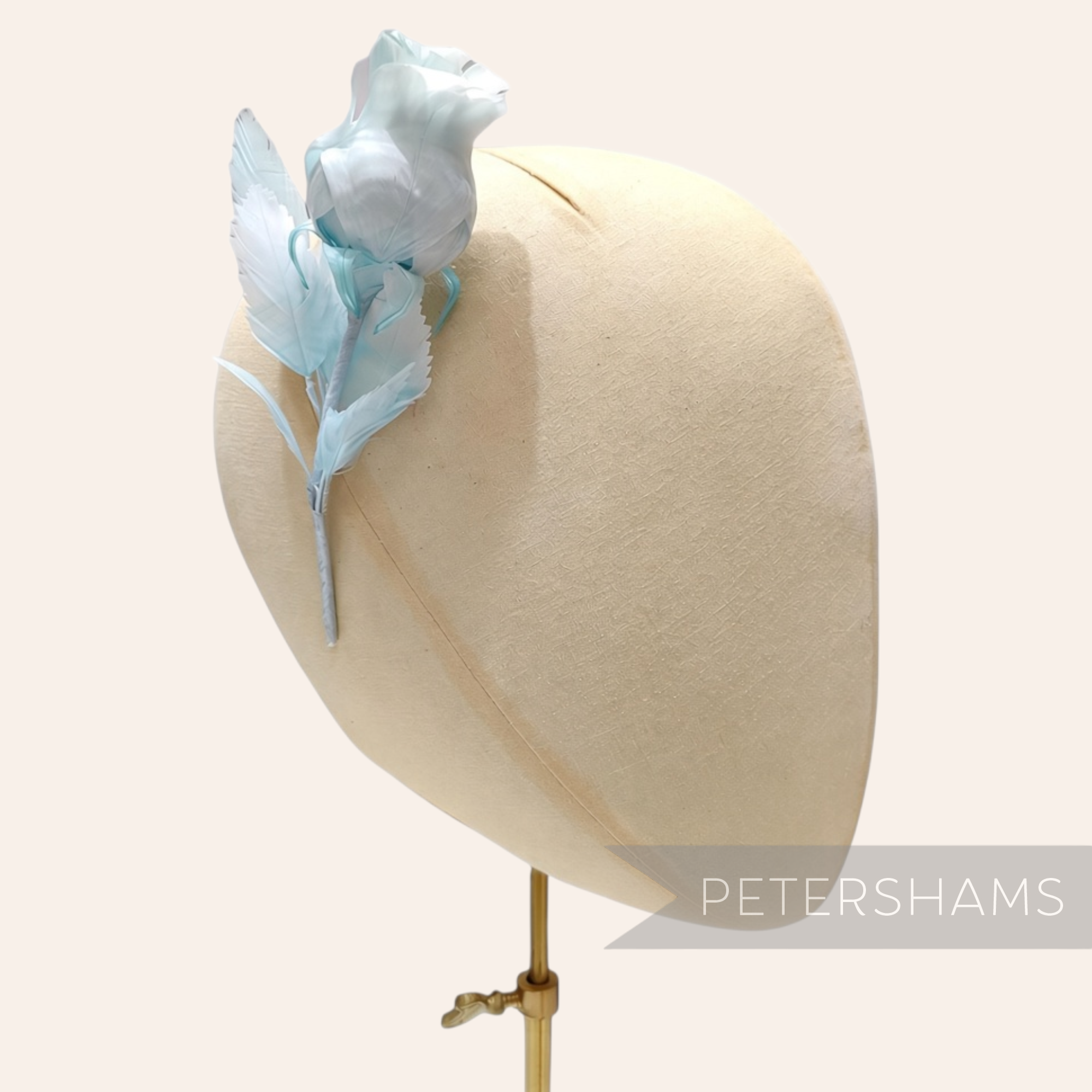 Petershams Millinery Supplies Belle light blue goose feather rosebud hat mount on a wired stem for millinery projects