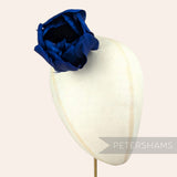 Petershams Millinery Supplies large royal blue tulip flower made from cupped goose nagorie feathers on a millinery head