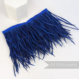 Petershams Millinery Supplies extra long royal blue goose biot feather fringe on a stitched satin ribbon binding.